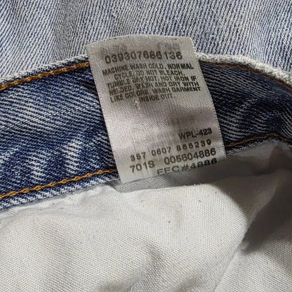 Levis 560 Comfort Fit Jeans Mens 38x30 Light Wash Distressed Baggy Tapered Denim